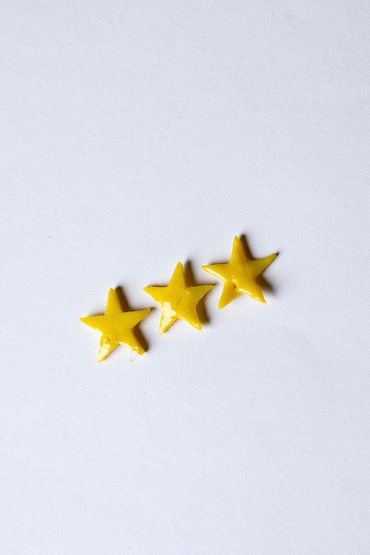 Charms étoile jaune